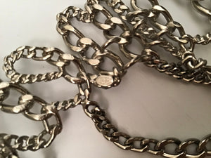 Here is the Chanel identification oval on this Chanel chain belt/necklace