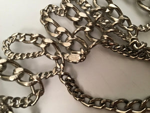 Here is the Chanel identification oval on this Chanel chain belt/necklace