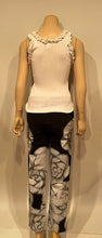 Load image into Gallery viewer, NWT Chanel 2016 Fall Ready to Wear Runway Black White Camellia Painted Jeans FR 38 US 4