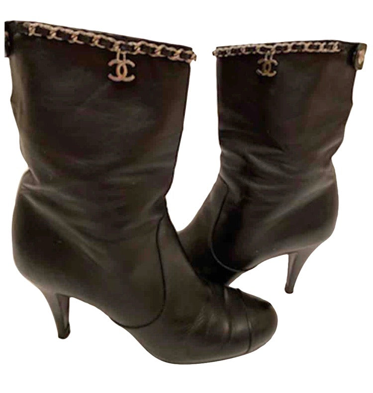 Leather boots Chanel Black size 38.5 EU in Leather - 36177678