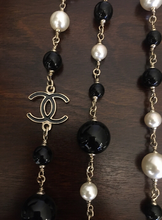 Load image into Gallery viewer, RARE Chanel 100th Anniversary 2010 Cruise 10C Black White Gold Pearl Coco Figure Sautoir 3 Strand Long Necklace