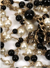 Load image into Gallery viewer, RARE Chanel 100th Anniversary 2010 Cruise 10C Black White Gold Pearl Coco Figure Sautoir 3 Strand Long Necklace