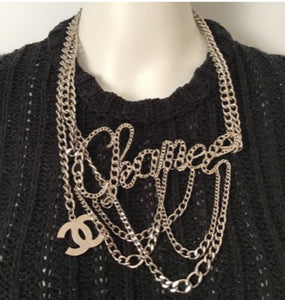 Rare Chanel cursive belt/necklace being worn as a Chanel necklace.